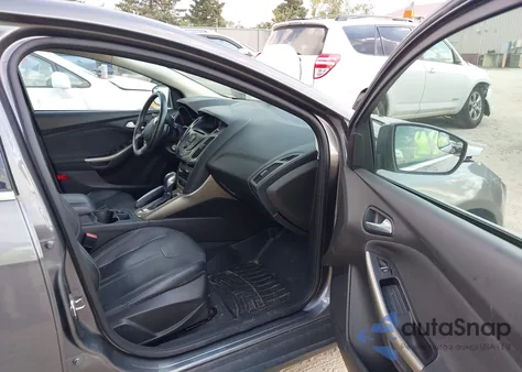 2012 Ford Focus Sel z USA, uszkodzony, nr VIN 1FAHP3M21CL404252